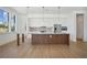 Bright and airy kitchen with a large central island and stainless steel appliances at 675 Drewry Ne St # 201, Atlanta, GA 30306