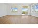 Bright living room with large windows and balcony access offering city views at 675 Drewry Ne St # 201, Atlanta, GA 30306