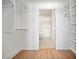 Walk-in closet providing ample storage space and an entrance to the bathroom at 675 Drewry Ne St # 201, Atlanta, GA 30306