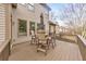 A view of the rear of the property featuring a patio table with seating for four on the back deck at 2953 Kings Walk Ave, Marietta, GA 30062