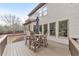 Spacious back deck with dining table and seating area, perfect for entertaining at 2953 Kings Walk Ave, Marietta, GA 30062