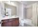 Bathroom featuring a shower-tub combo, vanity with drawers, toilet, and neutral color palette at 2953 Kings Walk Ave, Marietta, GA 30062