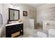 Bathroom with tiled shower, stylish vanity, and neutral color palette at 2953 Kings Walk Ave, Marietta, GA 30062