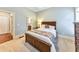 Serene bedroom with a plush carpet, soft lighting and ensuite door at 2953 Kings Walk Ave, Marietta, GA 30062