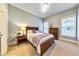 Calming bedroom with neutral paint, carpet, and windows providing natural light at 2953 Kings Walk Ave, Marietta, GA 30062