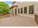 Large wooden deck with ample space for outdoor furniture, perfect for enjoying serene views and outdoor gatherings at 2953 Kings Walk Ave, Marietta, GA 30062