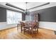 Formal dining room boasts hardwood floors, and a stylish chandelier at 2953 Kings Walk Ave, Marietta, GA 30062