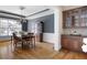 Dining room with hardwood floors and a built-in cabinet space for glassware and storage at 2953 Kings Walk Ave, Marietta, GA 30062