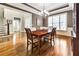 Elegant dining room featuring hardwood floors, crown molding, and a chandelier at 2953 Kings Walk Ave, Marietta, GA 30062