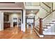 Open foyer with hardwood floors and staircase leading to upper level at 2953 Kings Walk Ave, Marietta, GA 30062