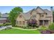 Attractive brick home with meticulously maintained landscaping, showcasing curb appeal at 2953 Kings Walk Ave, Marietta, GA 30062