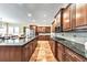 Modern kitchen boasting a large center island, custom cabinetry, and stainless steel appliances at 2953 Kings Walk Ave, Marietta, GA 30062