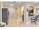 Stylish kitchenette area features tile flooring, a breakfast bar, and stainless steel appliances at 2953 Kings Walk Ave, Marietta, GA 30062