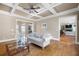 Inviting living room with coffered ceilings and hardwood floors at 2953 Kings Walk Ave, Marietta, GA 30062