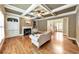 Cozy living room with coffered ceiling, built-in cabinets and hardwood flooring at 2953 Kings Walk Ave, Marietta, GA 30062