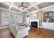 Comfortable living room with coffered ceiling, fireplace, and built-in shelving at 2953 Kings Walk Ave, Marietta, GA 30062