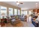 Cozy living room with hardwood floors, lots of windows and an adjacent dining area at 2953 Kings Walk Ave, Marietta, GA 30062