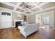 Elegant living room with coffered ceilings, a fireplace, and hardwood floors at 2953 Kings Walk Ave, Marietta, GA 30062