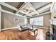 Bright living room featuring coffered ceiling, hardwood floors and large windows at 2953 Kings Walk Ave, Marietta, GA 30062