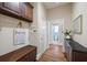 Functional mudroom with storage cabinet, bench, and convenient access to a bathroom at 2953 Kings Walk Ave, Marietta, GA 30062