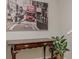 Entryway featuring a wooden console table, large picture and green potted plant at 3673 Howard Dr, College Park, GA 30337