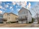 Exterior view featuring attached garages, wooden decks and manicured yard at 3673 Howard Dr, College Park, GA 30337