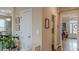 Hallway with neutral walls that leads to the dining room and living room with hardwood floors at 3673 Howard Dr, College Park, GA 30337