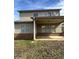 View of the back of the home and an outdoor back porch at 4373 Trake Way, Ellenwood, GA 30294