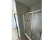 Bathroom featuring an open shower with glass door at 4373 Trake Way, Ellenwood, GA 30294