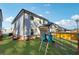 Large backyard with well-maintained lawn and playset, perfect for outdoor activities at 1405 Lyon Way Dr, Lawrenceville, GA 30044