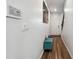 Bright entryway with wood floors, security panel and white trim at 1405 Lyon Way Dr, Lawrenceville, GA 30044