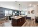 Spacious kitchen with large island and lots of natural light with neutral colors at 1405 Lyon Way Dr, Lawrenceville, GA 30044