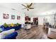 Open concept featuring the living room that goes into the kitchen and dining room with modern furnishings at 1405 Lyon Way Dr, Lawrenceville, GA 30044