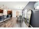 Bright living space showcasing the kitchen, dining area and modern design elements at 1405 Lyon Way Dr, Lawrenceville, GA 30044