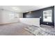 Spacious loft area with carpet flooring, windows, and neutral color scheme at 1405 Lyon Way Dr, Lawrenceville, GA 30044