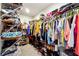 Organized walk-in closet featuring ample storage space for clothes, shoes and accessories at 1405 Lyon Way Dr, Lawrenceville, GA 30044