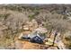 Aerial view of the home showing the backyard, garage, and surrounding trees at 1985 Lois Pl, Atlanta, GA 30318