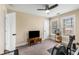 Bright bonus room with two windows, ceiling fan and space for exercise equipment or recreation at 1985 Lois Pl, Atlanta, GA 30318