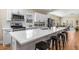 Spacious kitchen with stainless steel appliances, a large island, and hardwood floors at 1985 Lois Pl, Atlanta, GA 30318