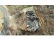 Aerial view of a beautiful single-Gathering home on a wooded lot in a cul-de-sac at 770 Bedford Oaks Dr, Marietta, GA 30068