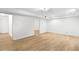 Unfurnished basement with wood flooring and white walls ready to be customized at 770 Bedford Oaks Dr, Marietta, GA 30068