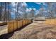 A spacious backyard with a privacy fence enclosing the entire space at 115 Hollybrook Rd, Atlanta, GA 30349