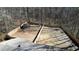 A spacious backyard with a privacy fence and a storage shed at 115 Hollybrook Rd, Atlanta, GA 30349