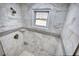 This bathroom has a new marble shower at 115 Hollybrook Rd, Atlanta, GA 30349