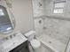 This bathroom has a new marble sink, toilet and shower at 115 Hollybrook Rd, Atlanta, GA 30349