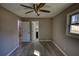 Empty bedroom with neutral walls, wood floors, and ceiling fan at 115 Hollybrook Rd, Atlanta, GA 30349