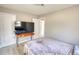 Bedroom with wood flooring, a bed and a stand for a TV at 115 Hollybrook Rd, Atlanta, GA 30349