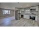 The kitchen has stainless steel appliances and wood flooring at 115 Hollybrook Rd, Atlanta, GA 30349