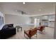 Spacious living room with modern lighting, sliding door to the backyard, and a contemporary design at 115 Hollybrook Rd, Atlanta, GA 30349
