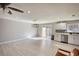 Bright living room features a sliding door to the backyard and modern finishes at 115 Hollybrook Rd, Atlanta, GA 30349